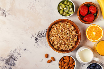Healthy breakfast - bowl of muesli, berries and fruit