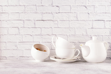 Fototapeta na wymiar Two cups and teapot for morning tea.