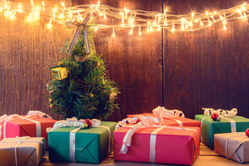 gifts and toys on wooden boards Decorated light