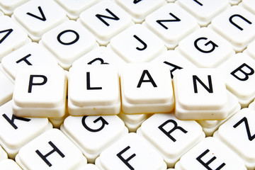 Plan text word crossword. Alphabet letter blocks game texture background texture.