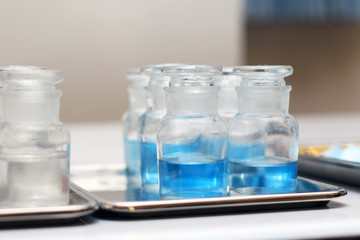 Reagent bottle with alcohol for medical training of operating room.