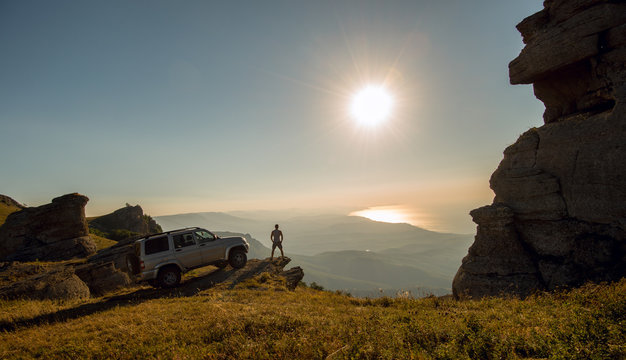 Man With Car On Beauty Nature Landscape Background