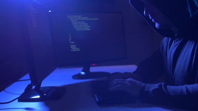 hacker using computer virus for cyber attack