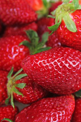 Strawberry strawberries. Stack of fresh red fruit background. Strawberry pattern closeup texture. Whole Strawberries.