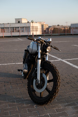 Naklejka premium Vintage custom motorcycle on parking
