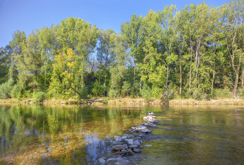 Fototapeta na wymiar river landscape with a green park