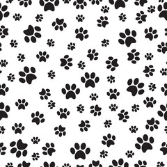 Fototapeta premium Paw print seamless pattern on a white background. Vector illustration