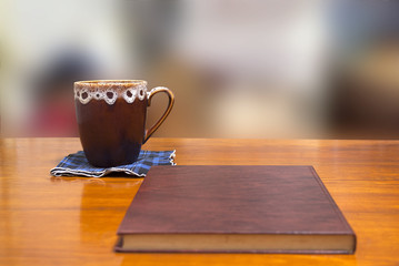 book and cup