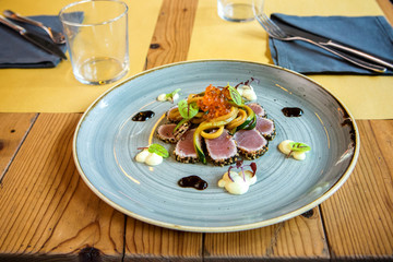 Serving of gourmet tuna fillet in a restaurant