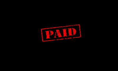 paid rubber stamp stencil text on a black background