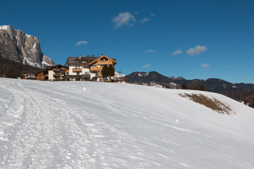 Mountain Hut and Ski Slope Landscape in Sunny Day