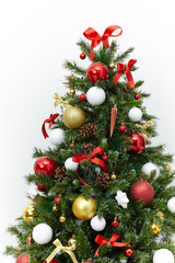 Fototapeta na wymiar Beautiful christmas tree with colorful ornaments isolated on a white background, studio shot