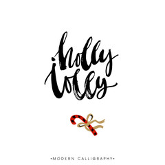 Fototapeta premium Holly Jolly. Christmas calligraphy. Handwritten modern brush lettering. Hand drawn design elements.