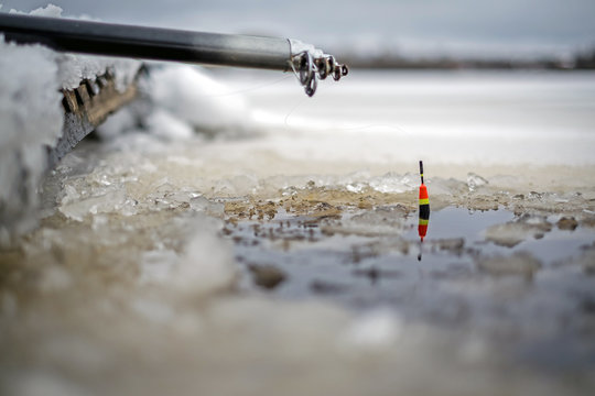 Fishing Pole With Float On Ice