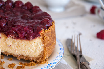 Homemade cheesecake with cherries on a plate