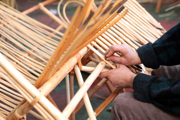 Production of furniture from the vine. Factory of creation of natural furniture. Manual production of furniture from wood. Wicker chair.
