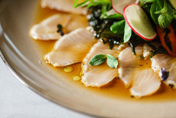 fish carpaccio with salad