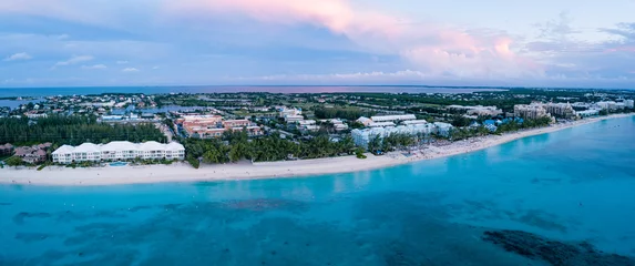 Store enrouleur Plage de Seven Mile, Grand Cayman aerial panoramic view of seven mile beach in the tropical paradise of the cayman islands in the caribbean sea after sunset