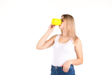 Young cute woman drinks coffee or tea, isolated  