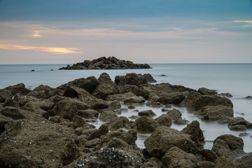 sunrise scenic with stone in foreground