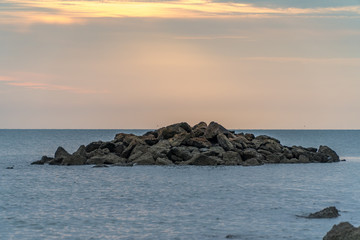 sunrise scenic with stone in foreground
