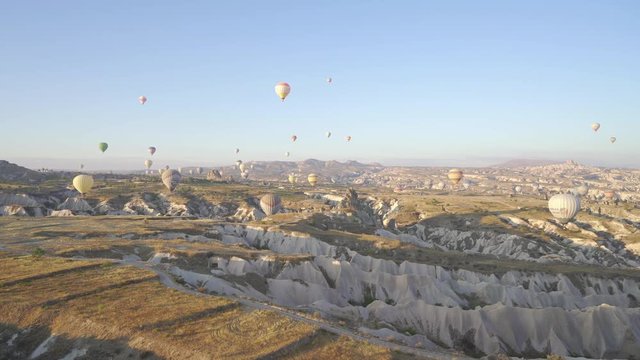 soaring balloons, Cappadocia, Turkey. Panorama filmed in flight as the sun rises