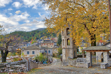 Sunset on a traditional alley in Megalo Papingo village in Ioannina, Greece