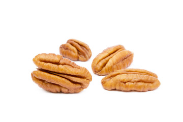 Fresh pecan nuts isolated on a white background