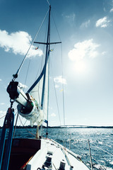 Yachting on sail boat during sunny weather