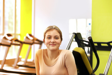 Fototapeta na wymiar After workout .Woman In Gym