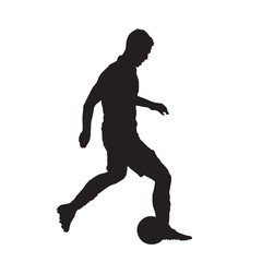 Fototapeta na wymiar Soccer player kicking ball, isolated vector silhouette. Side view