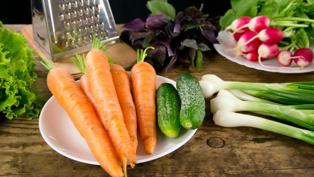 Assortment of vegetables on wooden table