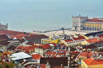 Obraz premium Lisbon from above: view of Baixa district and Rio Tejo (River Tagus) from Castelo de Sao Jorge