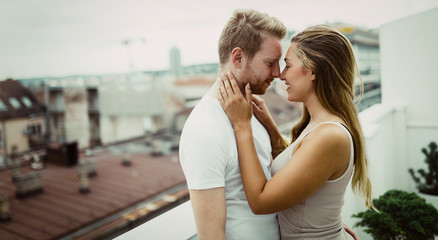 Romantic couple on rooftop