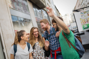 Happy young people having fun outdoors