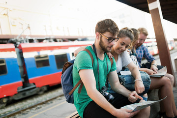 Group of friends traveling by train