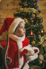Fototapeta na wymiar Christmas happy child with toy.