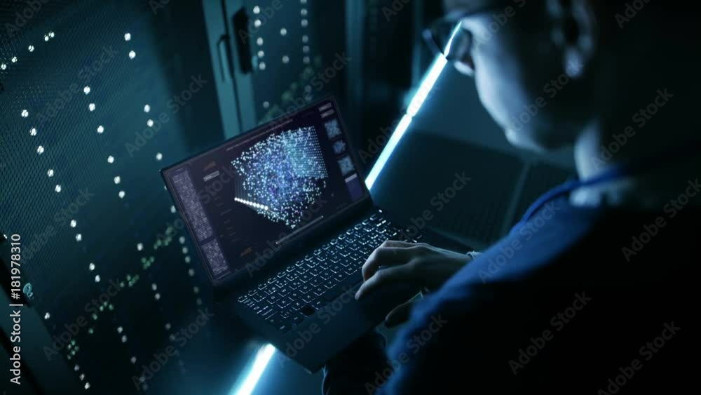 Aufkleber data center it engineer holds laptop and works on the neural network ai project.