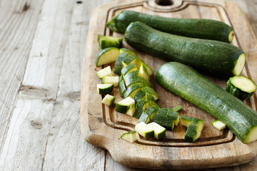 Fresh zucchini on wooden board