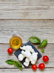 Italian cheese mozzarella nodini with tomatoes and herbs © katrinshine