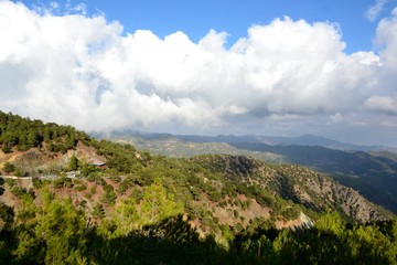 Fototapeta na wymiar Landscape of Troodos mountains from Cyprus and cloudy blue sky