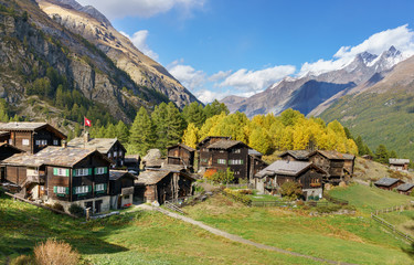 Fototapeta na wymiar Old wood chalets in village Zermatt, Switzerland.