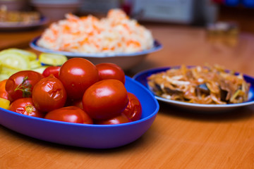 canned tomatoes and zucchini on a plate