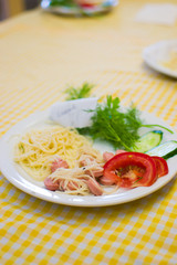 children learn to cook spaghetti in school cooks for small children