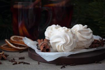 Homemade zephyr or marshmallows with mulled wine cinnamon oranges, anis. Christmas atmosphere