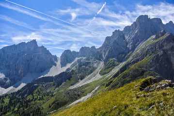 Alpine mountain peaks in  the Dolomites, Adolf Munkel Way at blue sky