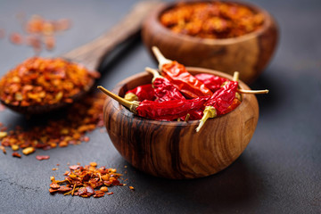 Red hot chili peppers on rusty background
