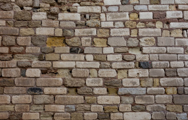 Fototapeta premium fragment of the old stone wall of the fortress of Constantinople