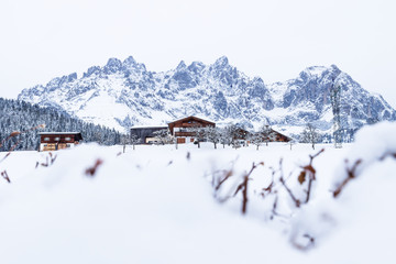 Fototapeta premium Wilder Kaiser mountainrange with snowheap, Going am Wilden Kaiser, Tyrol, Austria