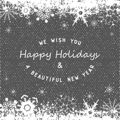 Happy holiddays greeting card with snowflakes on textured background